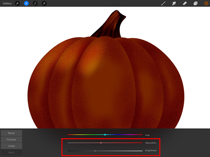 Reduce the brightness and saturation of the pumpkin