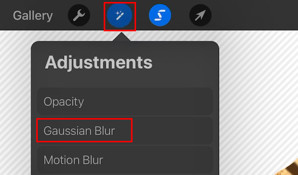 Tap on the adjustments button and tap Gaussian Blur